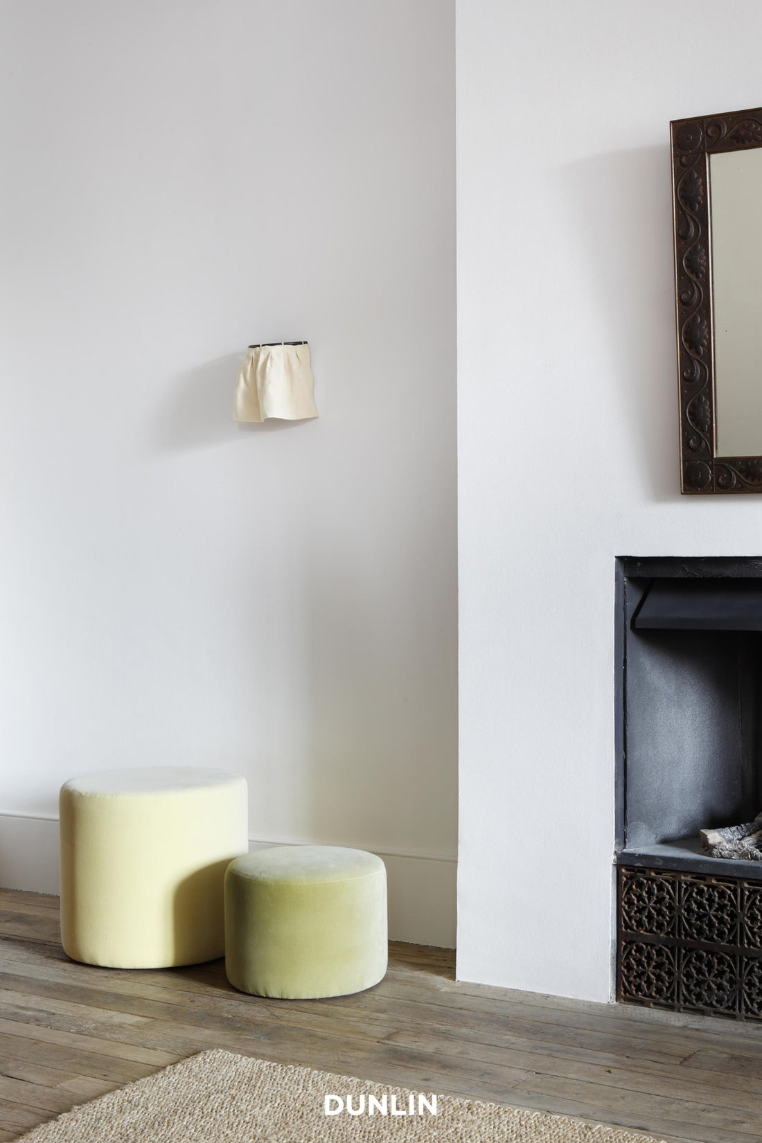 Skirt Wall Light by Rose Uniacke