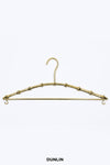 Brass Bamboo Hanger by Rose Uniacke