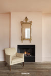 Reading Chair by Rose Uniacke fireplace