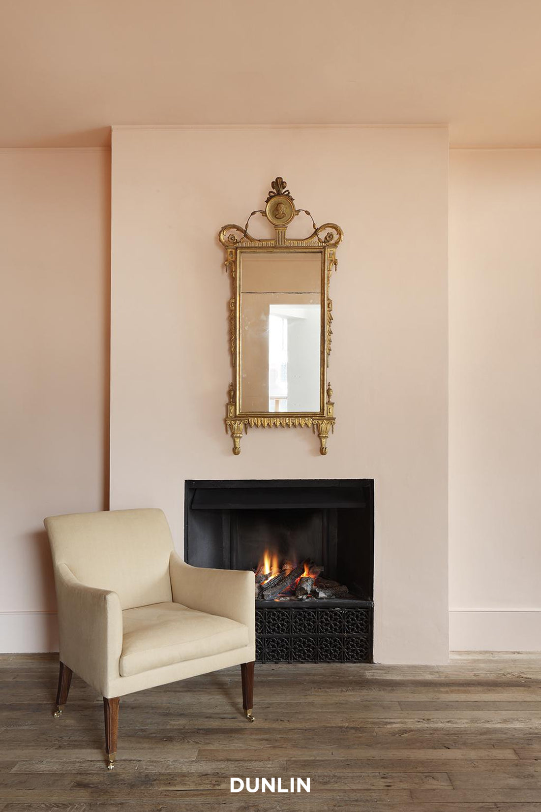 Reading Chair by Rose Uniacke fireplace