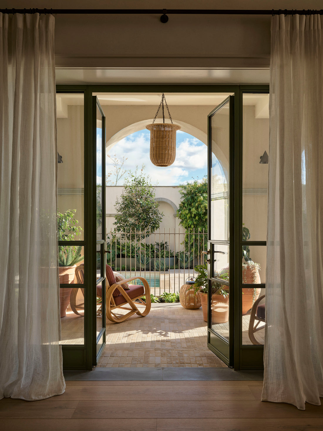 Claude Indoor / Outdoor Wall Light Weathered Brass by DUNLIN
