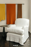 Mummy Chair by rose Uniacke in White loose cover 