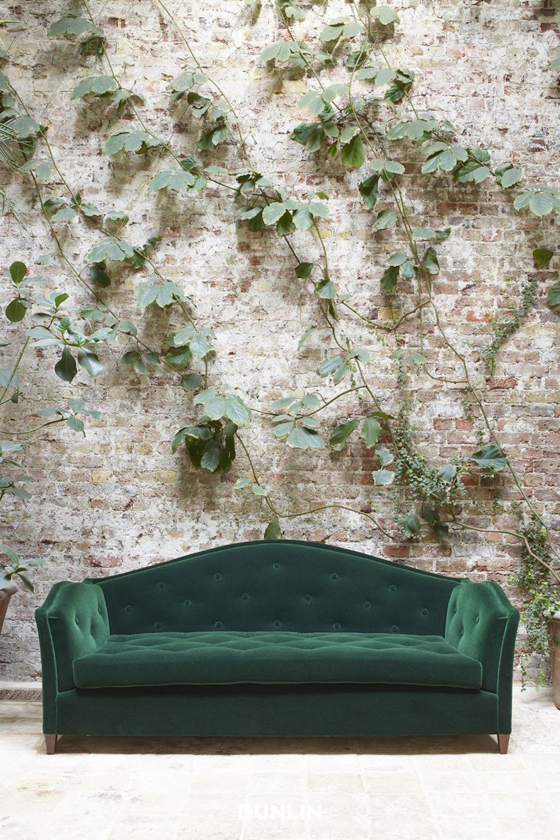 Serpentine Button Sofa by Rose Uniacke