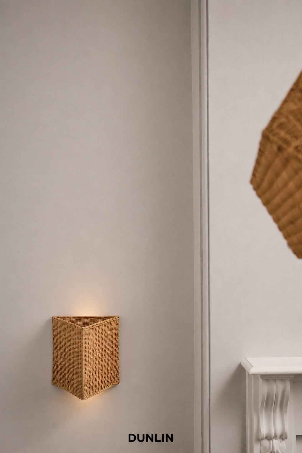 Triangle Rattan Wall Light by DUNLIN lit