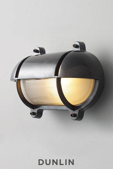 Oval Bulkhead Light with Eyelid by Davey Lighting